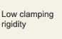 Low clamping rigidity